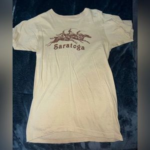 “Saratoga” cream colored t shirt. fits like a size medium!